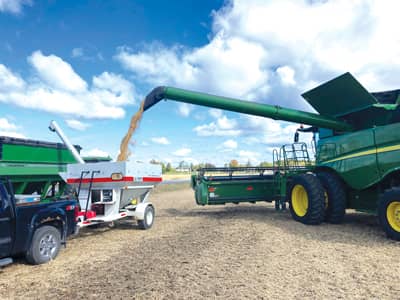 combine moving crop into weigh wagon