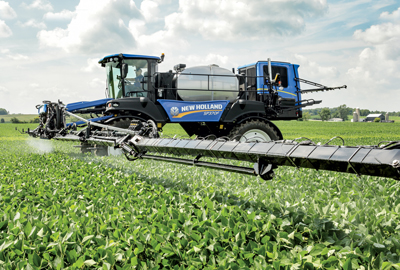 New Holland SP370F in the field spraying soybeans