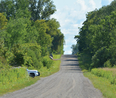 Rural Road with Hidden Police Car