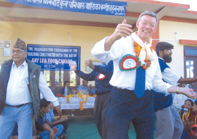 Ray celebrating school opening in Nepal.