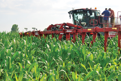 Sprayer in corn field