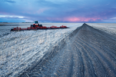 Winter field in the prairies at sunrise